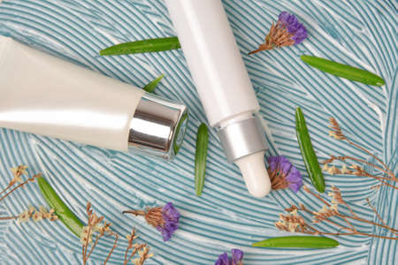 Natural skincare beauty products, Organic botany extraction, Blank label cosmetic container on cream texture background for branding mock-up.の写真素材
