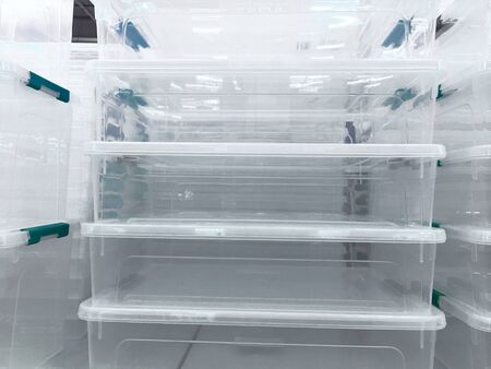 White transparent Plastic food containers on the shelf in the store