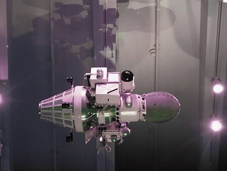Space satellite orbiting the earth on a background star sun. Elements of this image furnished