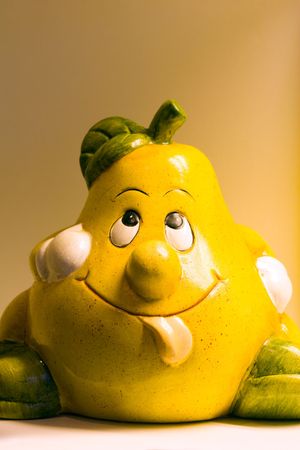 Funny pear face with out tongue and cap on headのeditorial素材