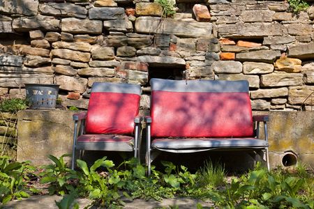 idyllic seat bench on an old Farmlandの写真素材