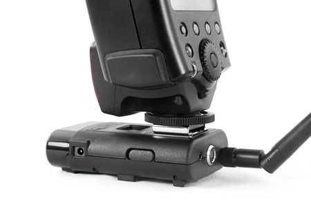 Flash with a receiver for remote triggering