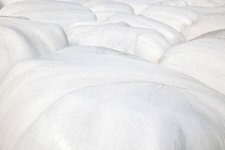 detail of white packed straw bales - Background and Afterimageの写真素材