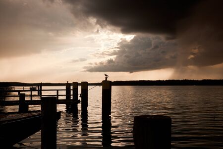 evening Sunset at a pier at Werbellinseeの写真素材