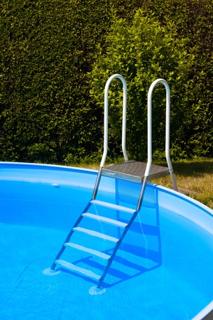 blue Water in round swimming pool with letterの写真素材