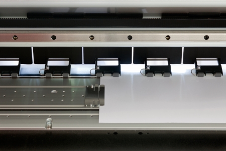 large format ink jet printer Detail with paper rollの写真素材