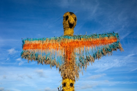 Thanksgiving straw figure in Front of blue skyの写真素材