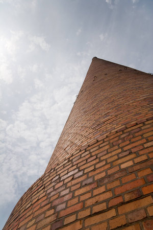 a huge industrial chimney from the frog perspectiveの写真素材