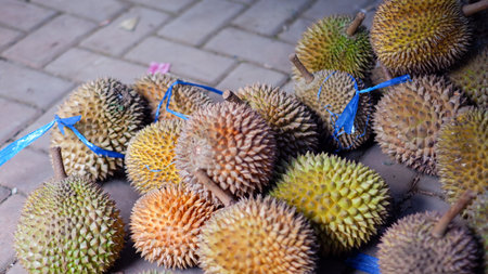 heaps of small durian ready for sale