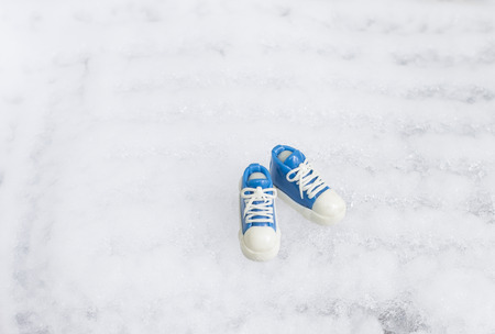 Shoes simulation on ice background,Christmasの写真素材