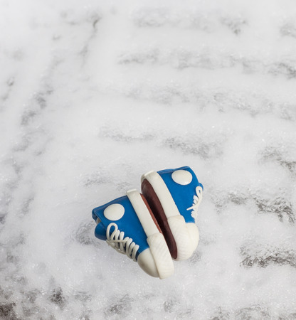Shoes simulation on ice background,Christmasの写真素材