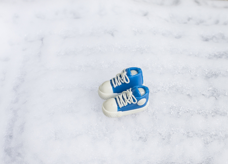 Shoes simulation on ice background,Christmasの写真素材