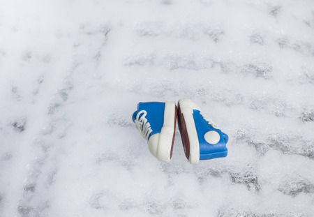 Shoes simulation on ice background,Christmasの写真素材