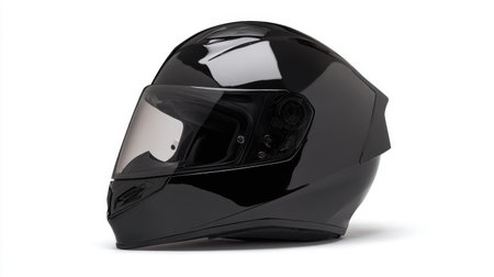 This image features a glossy black motorcycle helmet set against a clean white background, emphasizing safety and style for riders. The design showcases modern technology and sleek aesthetics.の素材