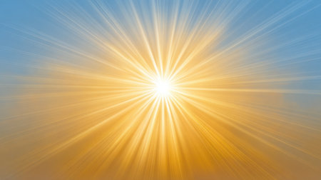 A stunning sunburst effect creating a warm and vibrant atmosphere against a soft blue sky, perfect for use as a background or decorative element.の素材