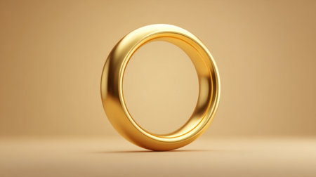 This image features a stunning gold ring set against a soft gradient background, ideal for themes of love, weddings, and luxury jewelry designs.の素材