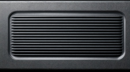 This close-up image features a black textured surface characterized by horizontal grooves and lines, ideal for design projects and backgrounds.の素材