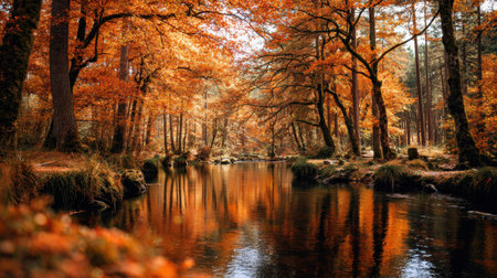 A captivating autumn scene featuring golden leaves and a calm river reflecting the serene forest surroundings, inviting peaceful introspection in nature.の素材