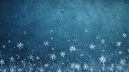 This captivating image features delicate snowflakes gently falling against a rich blue gradient background with a textured finish, perfect for winter-themed projects.の素材