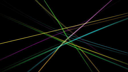 This vibrant image showcases colorful light trails intersecting over a black background, creating dynamic and abstract patterns perfect for visual projects.の素材