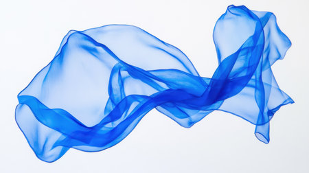 This image features a flowing piece of blue silk fabric that creates an ethereal and elegant aesthetic. Its smooth and transparent quality adds a delicate touch, perfect for artistic projects.の素材