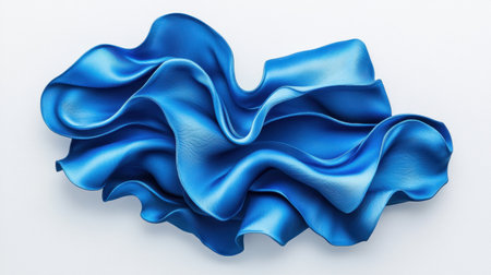 This image features an elegant blue fabric showcased in a wave-like form, highlighting its soft curves and luxurious texture, ideal for creative design.の素材