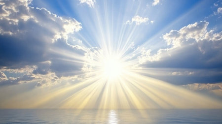 A breathtaking view of sunlight piercing through fluffy clouds over a calm ocean, creating a serene and tranquil moment at dawn. Perfect for nature enthusiasts.の素材