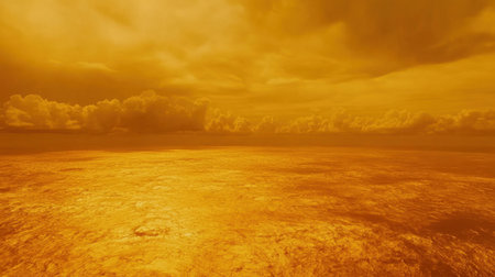 A stunning view of an expansive ocean reflecting warm golden hues of the sky, surrounded by dramatic clouds, creating a calming and peaceful atmosphere.の素材