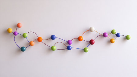A visually striking arrangement of colorful beads connected by wires, offering a playful and artistic vibe perfect for creative and design projects.の素材
