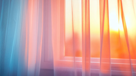 Gentle sunlight streams through sheer curtains, creating a serene and inviting atmosphere. This image captures the beauty of soft light at sunset, perfect for cozy interiors.の素材