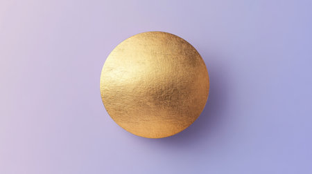 A striking round metallic gold object positioned on a smooth purple background, creating a stunning visual contrast and highlighting design elegance.の素材