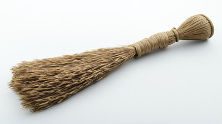 This natural handmade broom features straw bristles and a rustic design, ideal for eco-friendly cleaning and enhancing home decor. Perfect for minimalist aesthetics.の素材