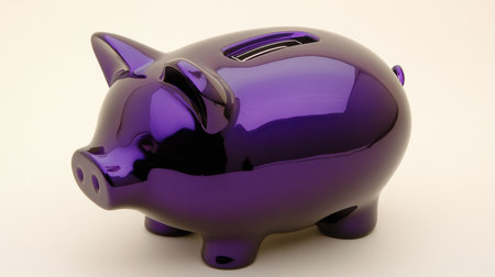 This shiny purple piggy bank serves as a creative tool for savings and financial planning, perfect for both children and adults in a neutral setting.の素材
