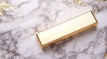 This image showcases a stunning golden rectangular object, gracefully placed on a marble surface featuring elegant gold accents, ideal for sophisticated presentations.の素材