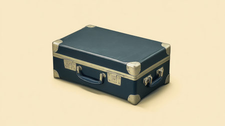 A vintage green suitcase featuring metal accents, perfect for travel-themed projects. Its classic design adds a nostalgic touch to any setting.の素材