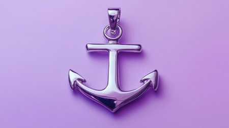 This image features a shiny silver anchor pendant resting on a soft purple background, representing hope and stability in contemporary jewelry design.の素材