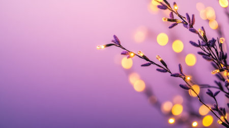 A close-up image featuring delicate twigs adorned with warm fairy lights, set against a soft purple background, creating a tranquil and inviting atmosphere.の素材