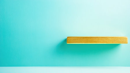 A vibrant gold shelf displays an elegant contrast against a soft blue backdrop, embodying modern minimalism and offering a serene aesthetic for decor.の素材