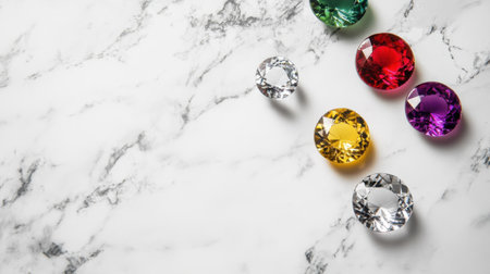 A stunning arrangement of colorful gems sits gracefully on a marble background, showcasing unique colors and reflections, ideal for luxury concepts.の素材