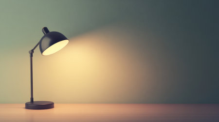 A modern desk lamp shines warmly against a minimal wall, casting soft shadows on a wooden surface, creating an inviting atmosphere for any workspace.の素材