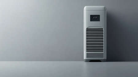 A modern air conditioning unit featuring a digital display against a minimalist gray backdrop, ideal for enhancing interior spaces and ensuring comfort.の素材
