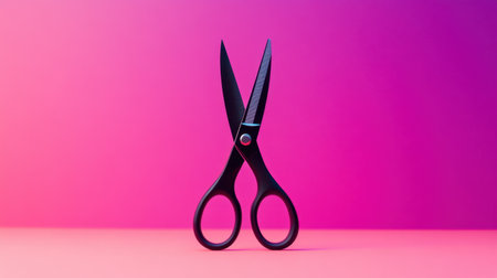 Stylish black scissors set against a vibrant pink and purple background. Ideal for showcasing craft, design, and stationery themes in modern visuals.の素材