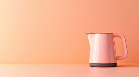 A sleek pink electric kettle sits elegantly against a soft peach backdrop, ideal for showcasing modern kitchen aesthetics, culinary themes, and design elegance.の素材
