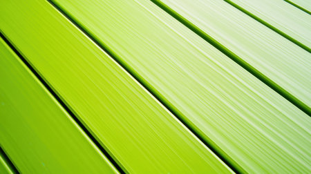 This image showcases a vibrant green texture of smooth wooden planks, perfect for projects that emphasize nature, environment, and eco-friendliness.の素材