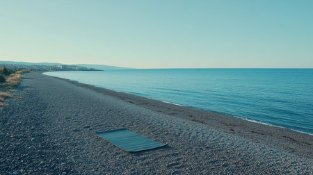 A serene beach landscape showcasing calm waters and clear skies at sunrise. This secluded coastal area invites relaxation and tranquility for any nature lover.の素材