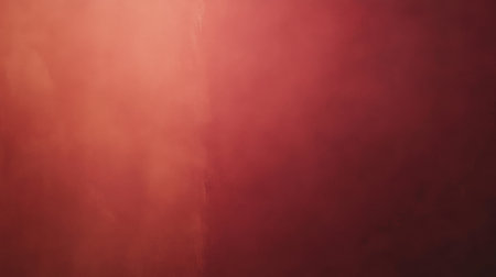 This image showcases a soft gradient texture featuring warm tones of red and pink, creating a moody and atmospheric backdrop perfect for various design projects.の素材