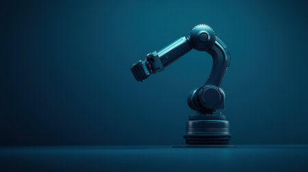 A sleek robotic arm stands prominently against a dark background, representing advanced technology in automation and innovation within industry settings.の素材