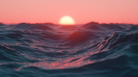 A breathtaking view of a tranquil ocean at sunset, highlighting gentle waves under a vibrant pink and orange sky during dusk. Perfect for nature lovers.の素材