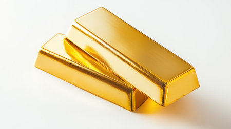 This image features two gleaming gold bars, perfectly stacked, symbolizing wealth and luxury against a clean white background, ideal for financial themes.の素材