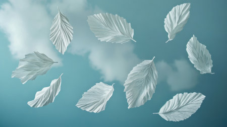 This beautiful composition features white leaves floating gracefully against a soft blue background, evoking a sense of tranquility and creativity. Perfect for nature-themed projects.の素材